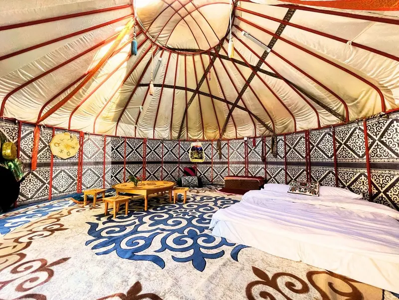 Luxury yurt interior with a bed